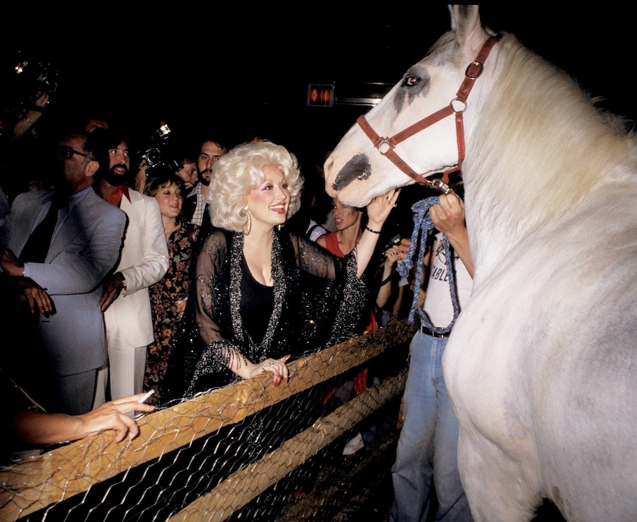 Dolly Parton with a horse during an after party at Studio 54 0