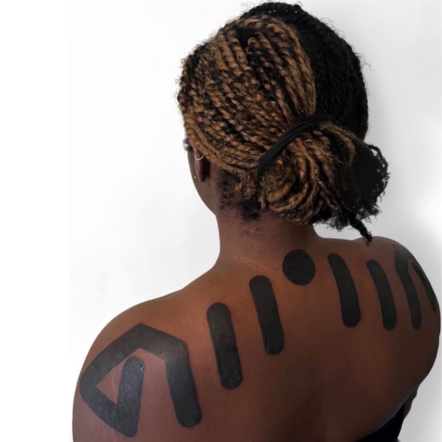 AFRODERM tattoo convention Black skin 22