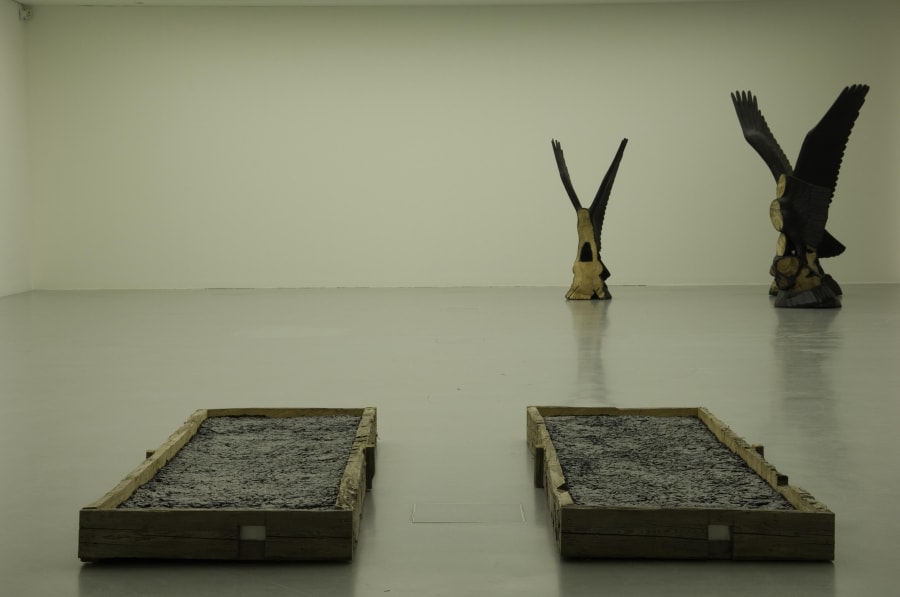 In the background: Three, 2008 mahogany/tar variab 2