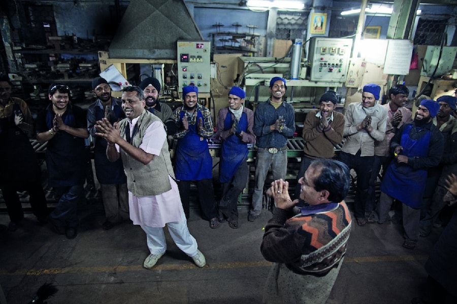 Jiten Kohi, 45, leads a laughter yoga session at S 1
