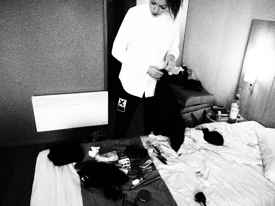  Colette packing for the Shepherd's Bush show. 11