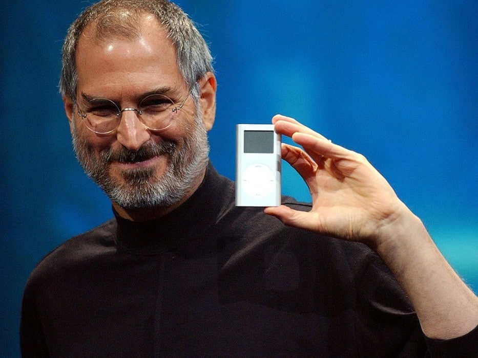 Apple co-founder Steve Jobs with an iPod