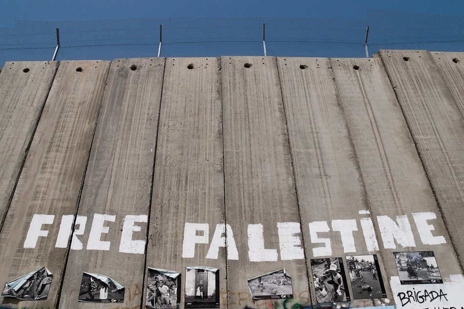 Israel West Bank barrier Free Palestine graffiti