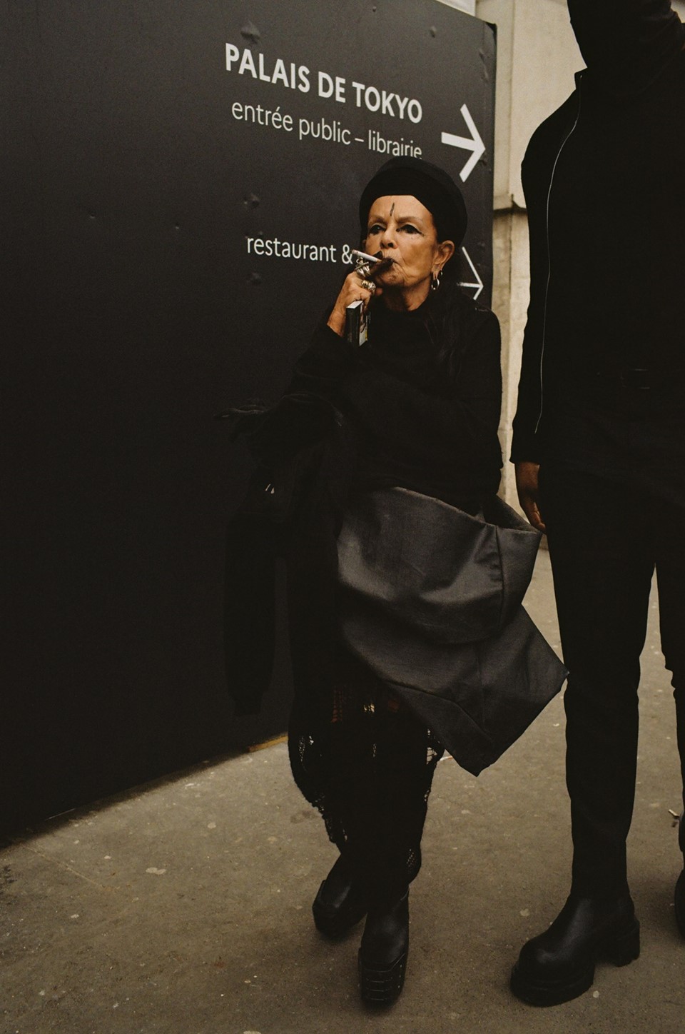 Photos of Mich le Lamy smoking at Paris Fashion Week Menswear Dazed